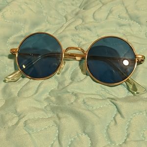 John Lennon sunglasses.